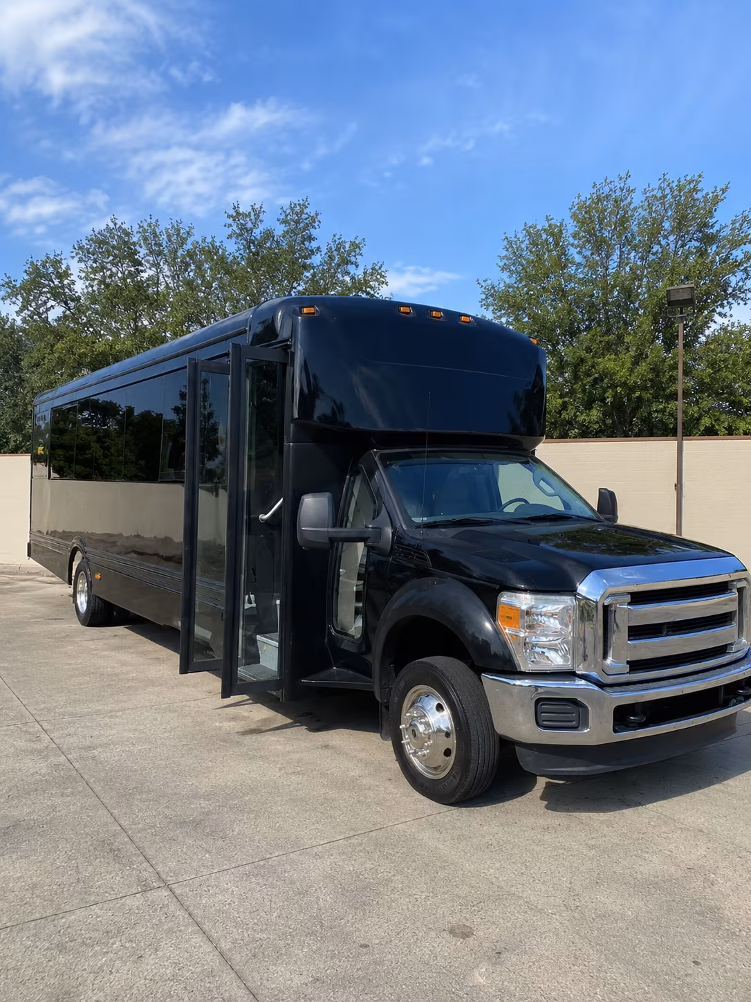 Wedding guests seated inside a party bus serving El Paso